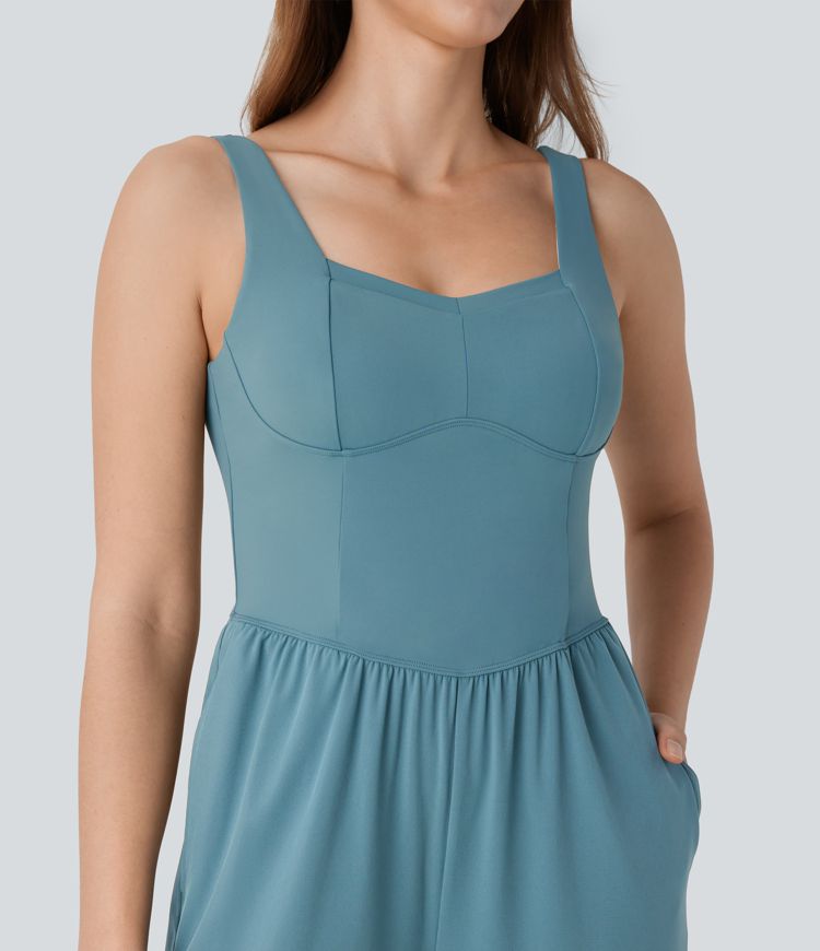 Mono Breezeful™ yoga secado rápido pierna recta bolsillo lateral sin espalda