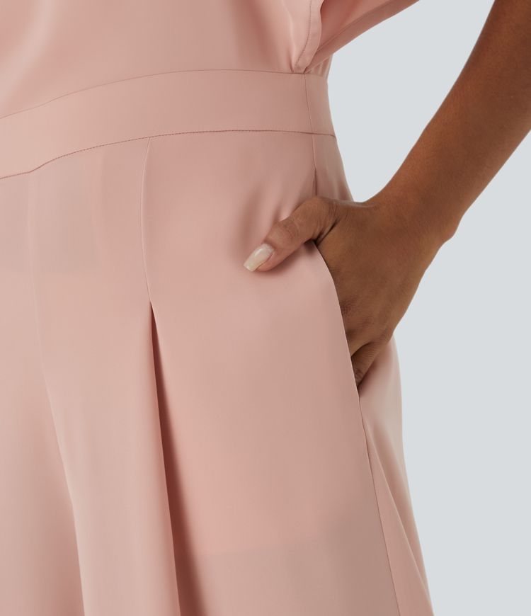 Combinaison fluide décolletée en V avec manches papillon et poches latérales pour mariage