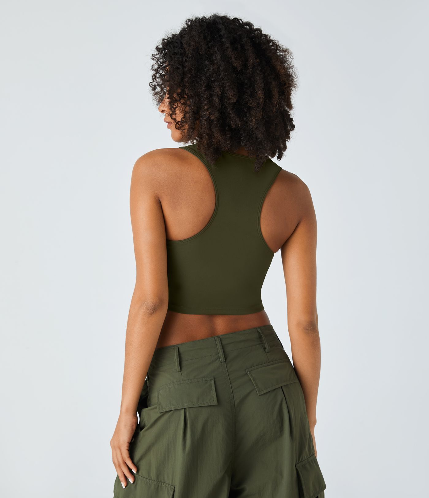 DayStretch - Kurzes Tanktop mit Racerback, Cut-Outs und Rissen