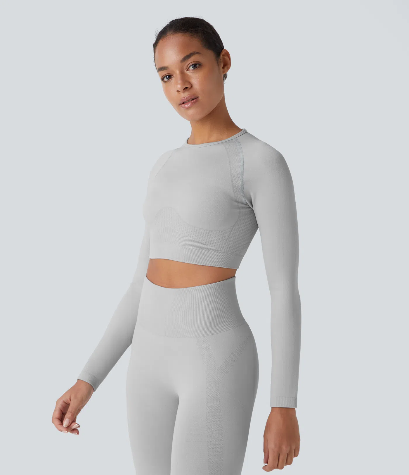 Schmales Yoga-Top mit langen Raglan-Ärmeln, Rundhalsausschnitt und nahtlosem Flow
