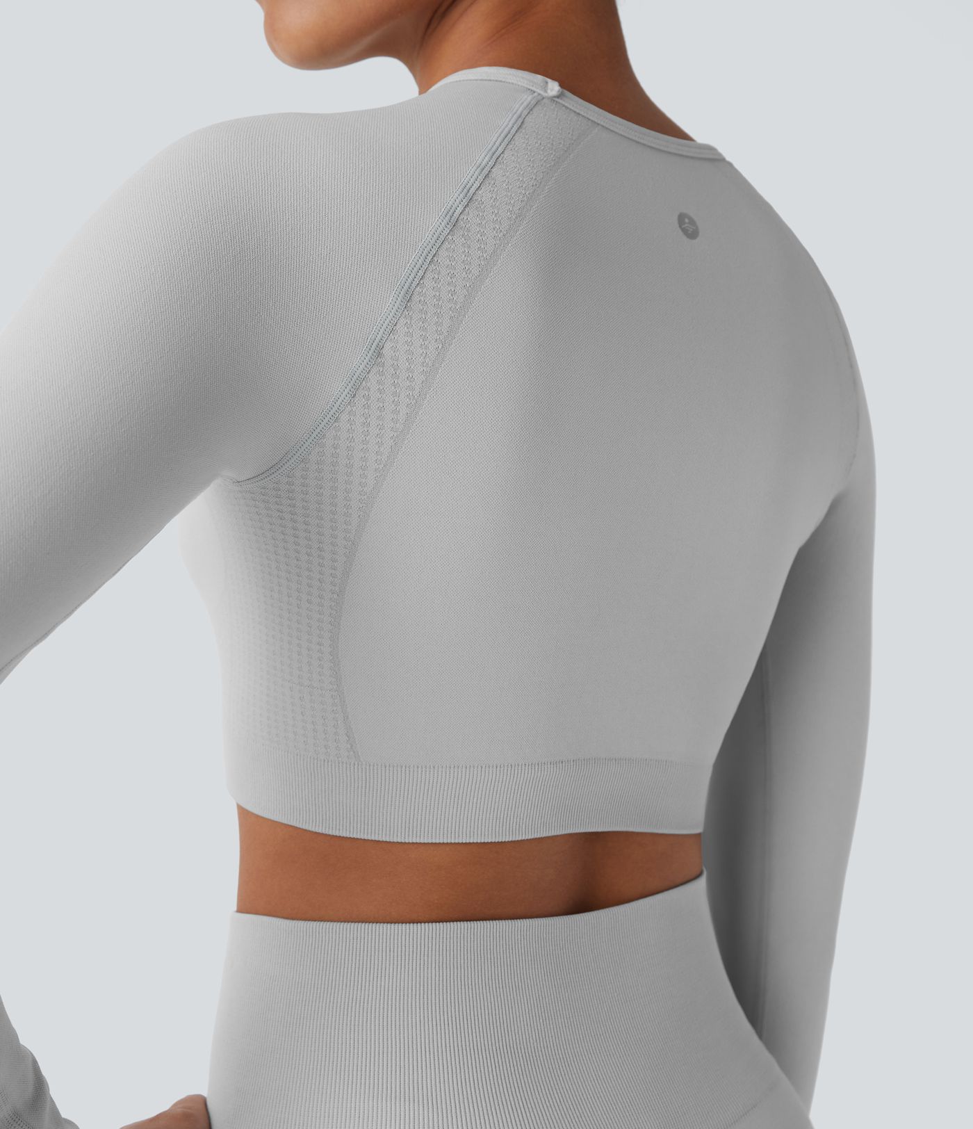 Top yoga ajustado corto manga raglán cuello redondo sin costura