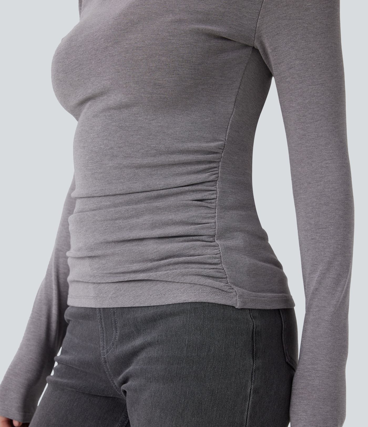 Haut thermique moulant à col cheminée, manches longues et fronces