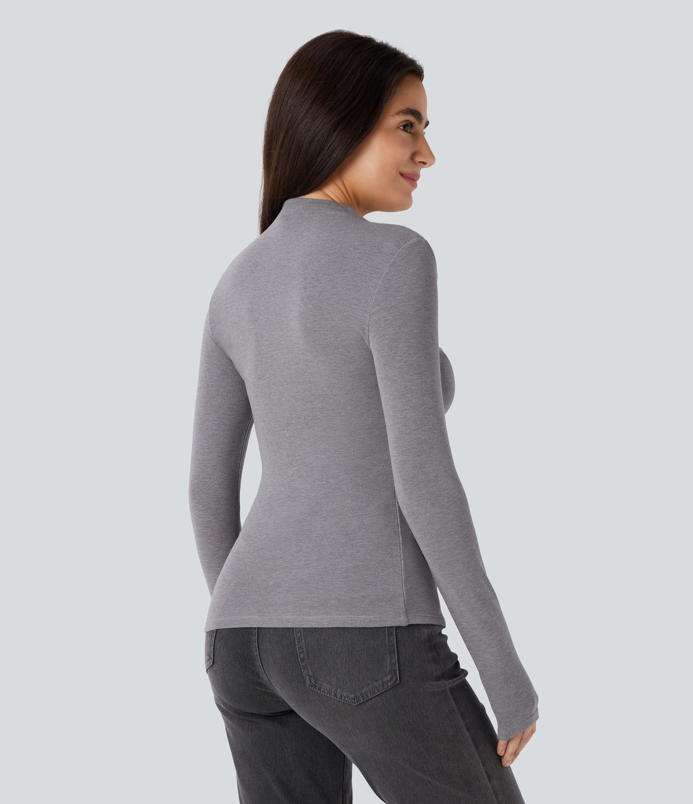 Haut thermique moulant à col cheminée, manches longues et fronces