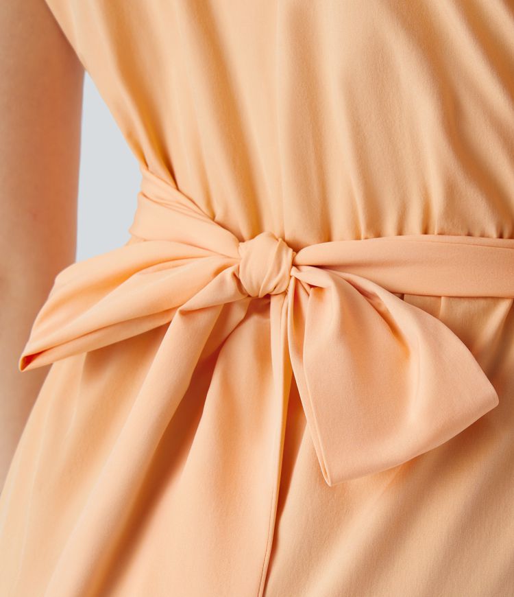 Breezeful™ Kurzärmliges Midi-Freizeitkleid mit V-Ausschnitt, Seitentaschen und Bindeband hinten - schnelltrocknend