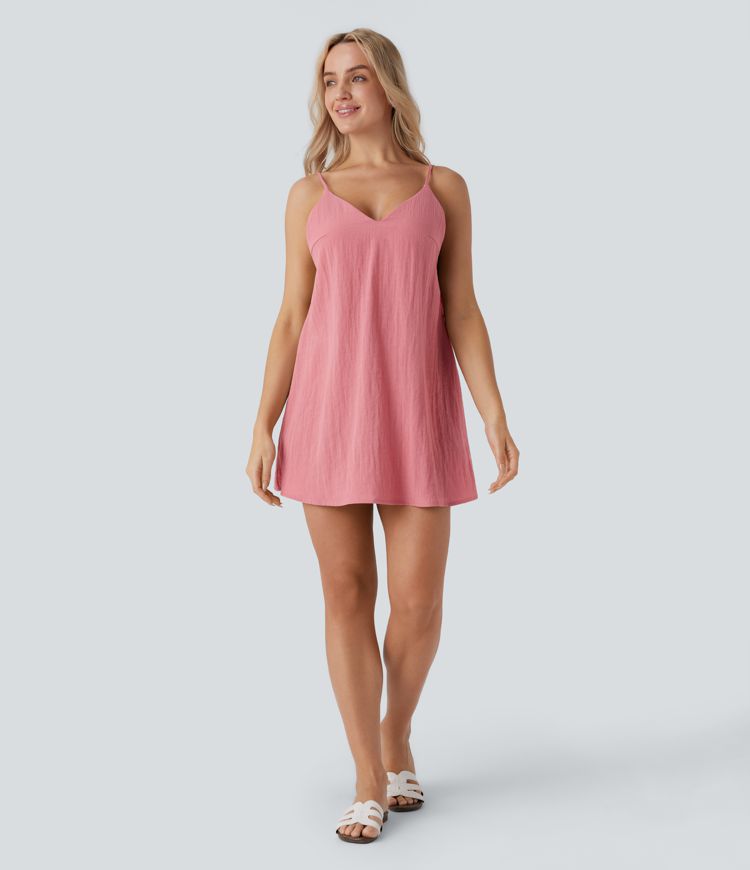 Vestido resort lino cuello V tirante ajustable sin espalda bolsillo lateral lazo espalda