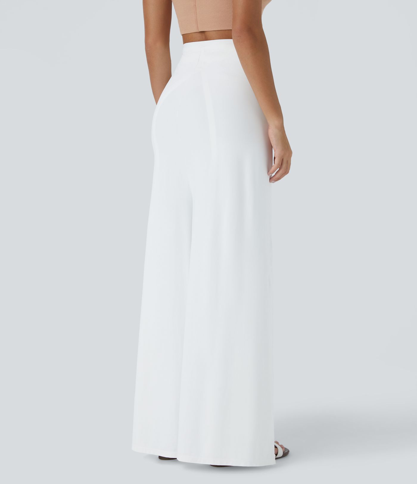 Pantalón palazzo fluido ancho con tiro alto y lazo delantero