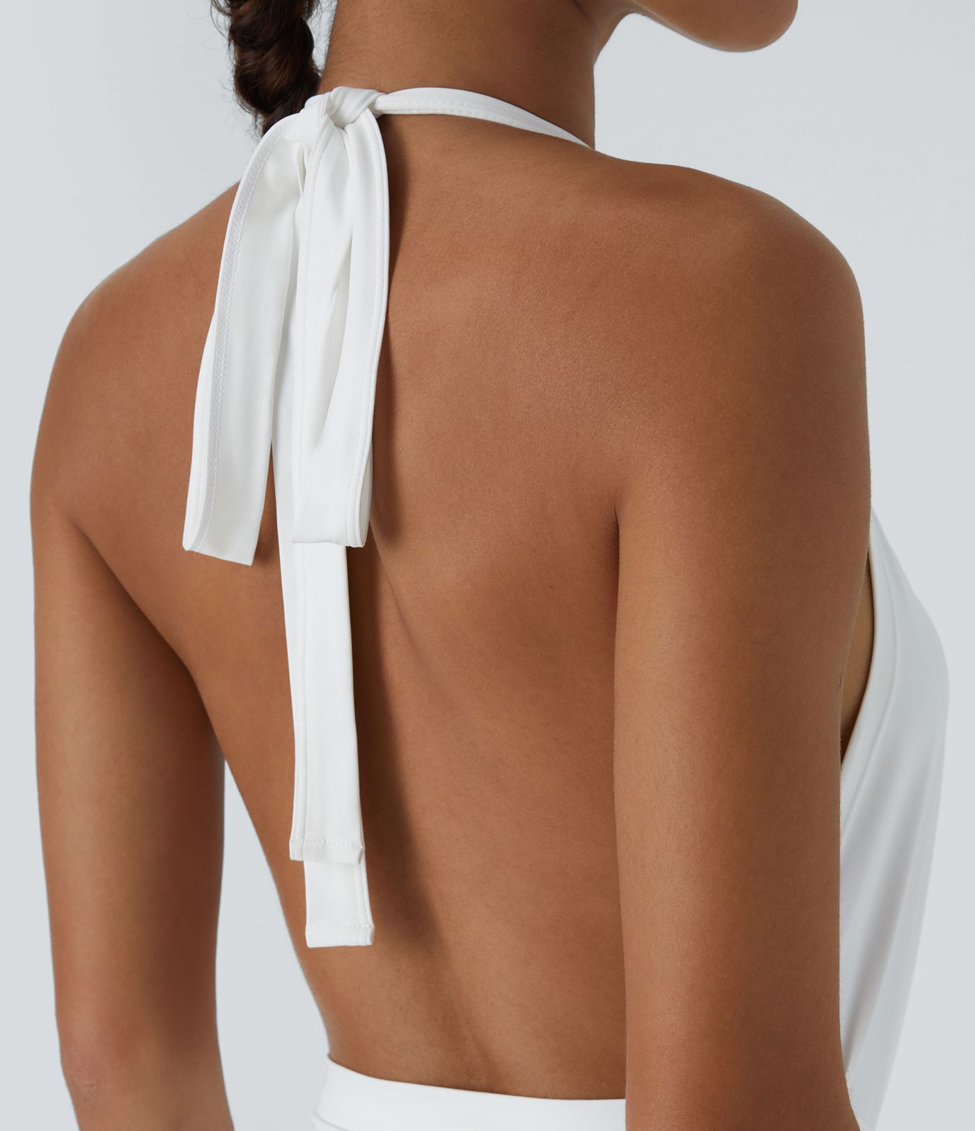 Pantalón palazzo fluido ancho con tiro alto y lazo delantero