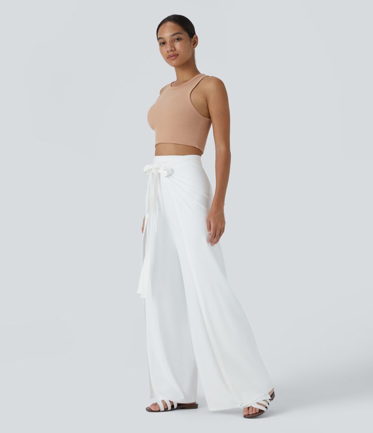 Pantalón palazzo fluido ancho con tiro alto y lazo delantero