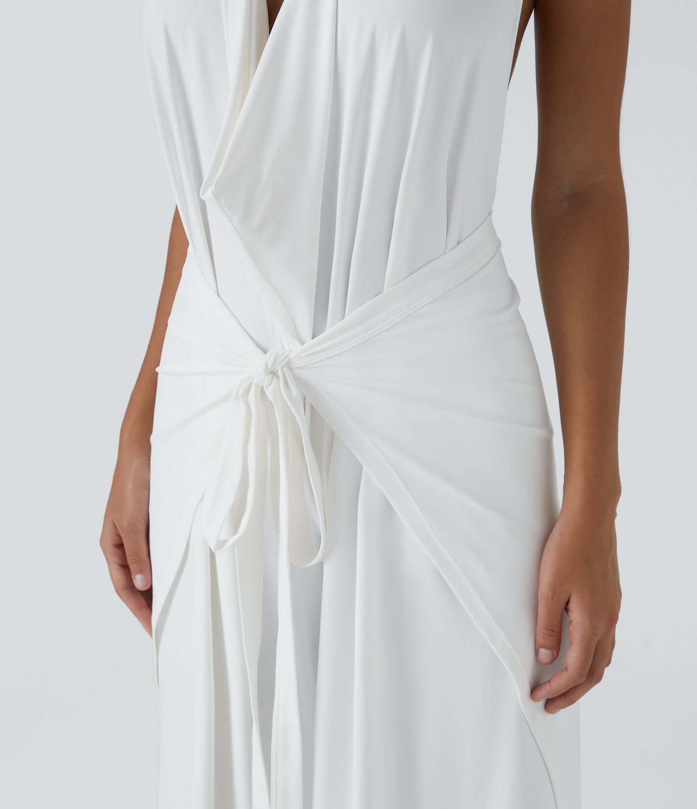 Pantalón palazzo fluido ancho con tiro alto y lazo delantero