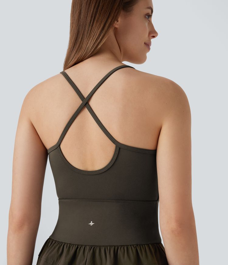 Mono cargo de senderismo impermeable con tejido resistente antidesgarro con espalda abierta cruzada y bolsillos laterales