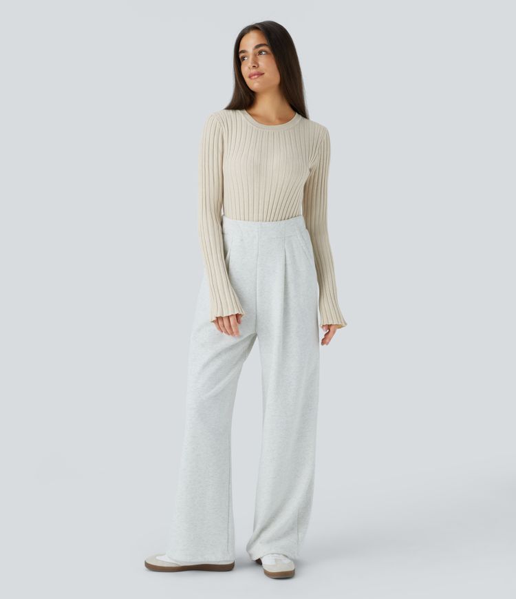 Suéter cuello redondo manga larga volante