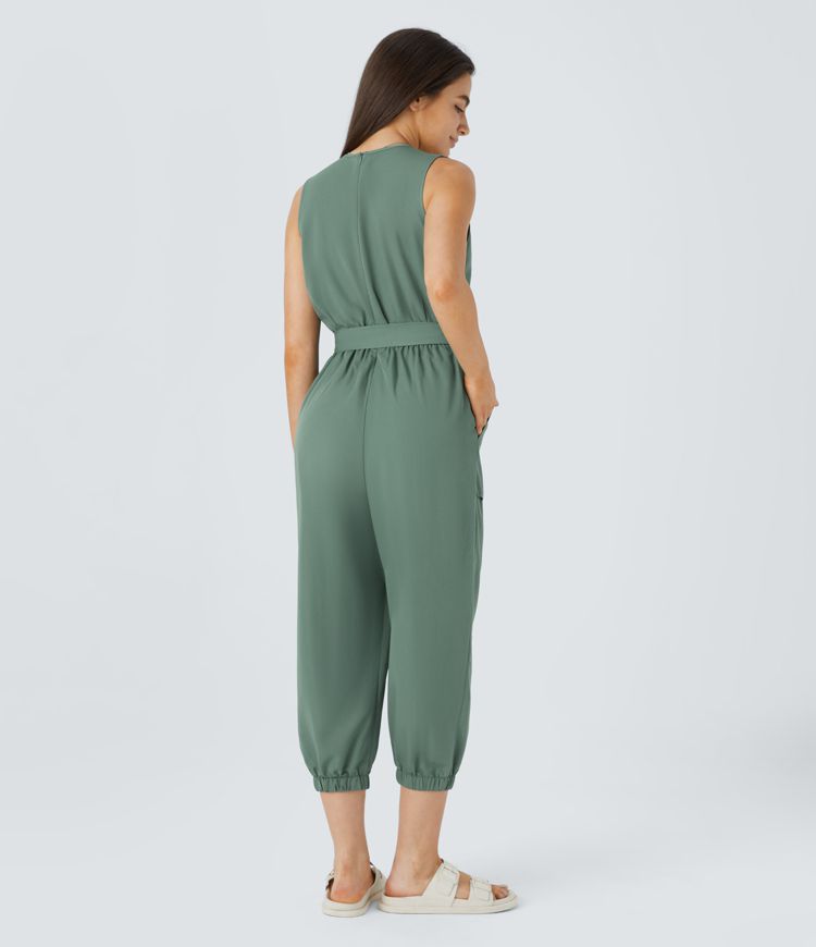 V-neck sleeveless zipper belted jumpsuit with side pocket details in a casual style.