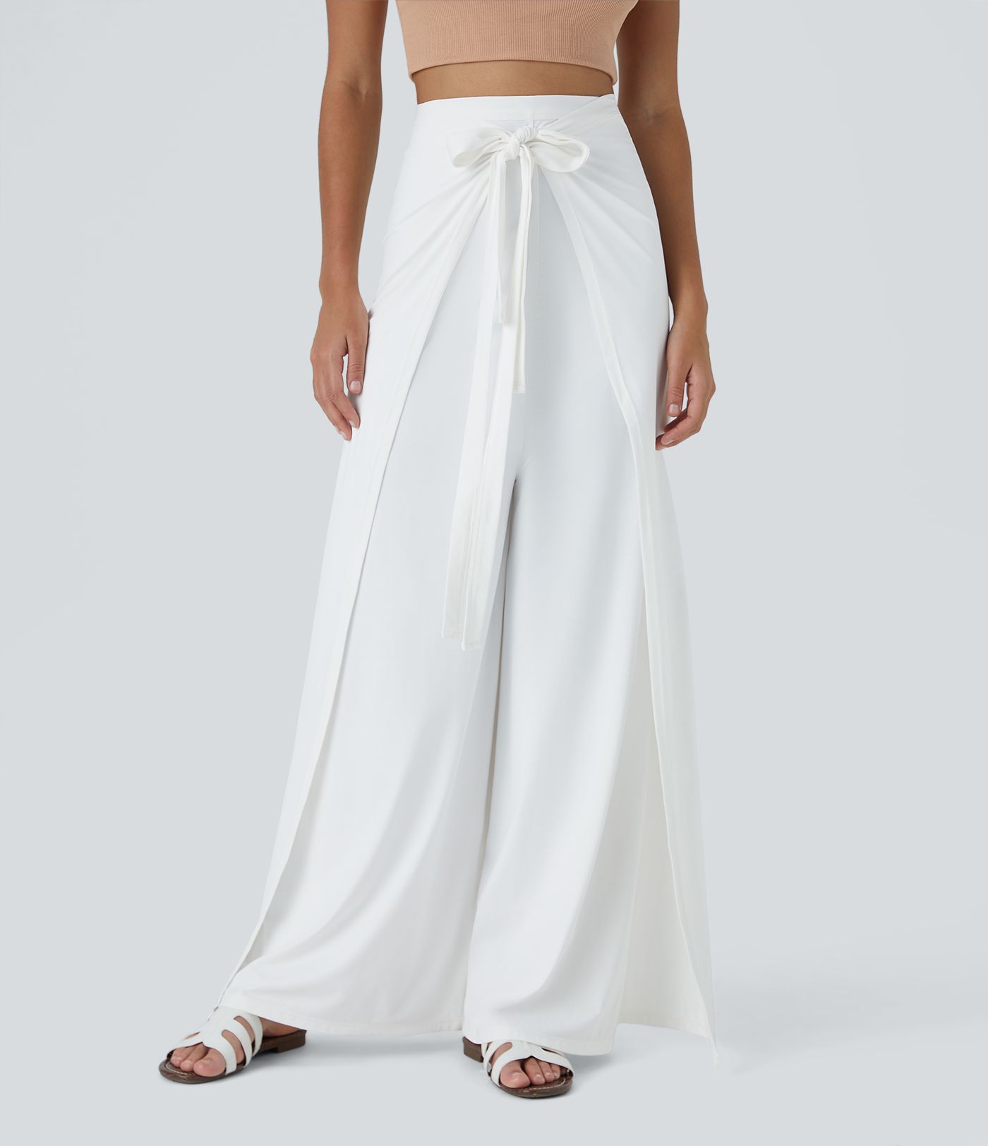 Pantalón palazzo fluido ancho con tiro alto y lazo delantero