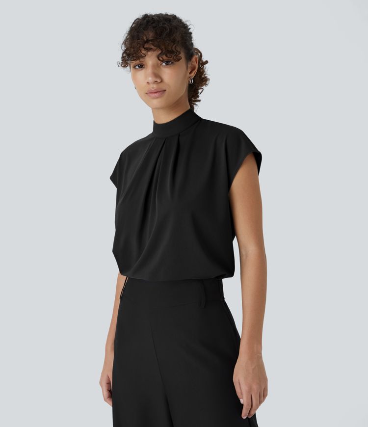 Arbeitsbluse mit Stehkragen, Knopfleiste auf der Rückseite und Flügelärmeln