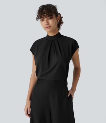 Arbeitsbluse mit Stehkragen, Knopfleiste auf der Rückseite und Flügelärmeln