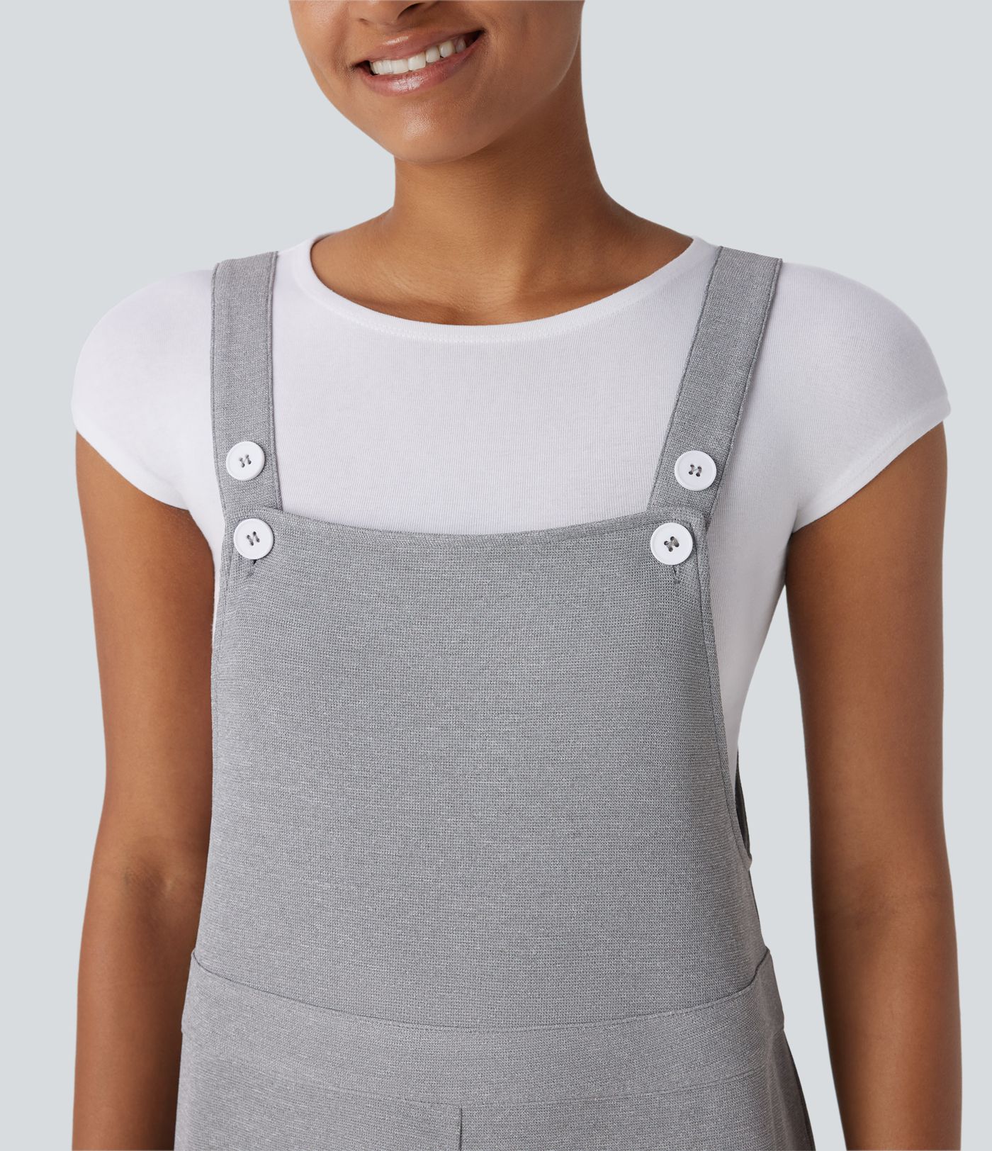 Lässige Latzhose mit Seitentaschen, verstellbaren Trägern, Knöpfen und weitem Bein - beidseitig tragbar