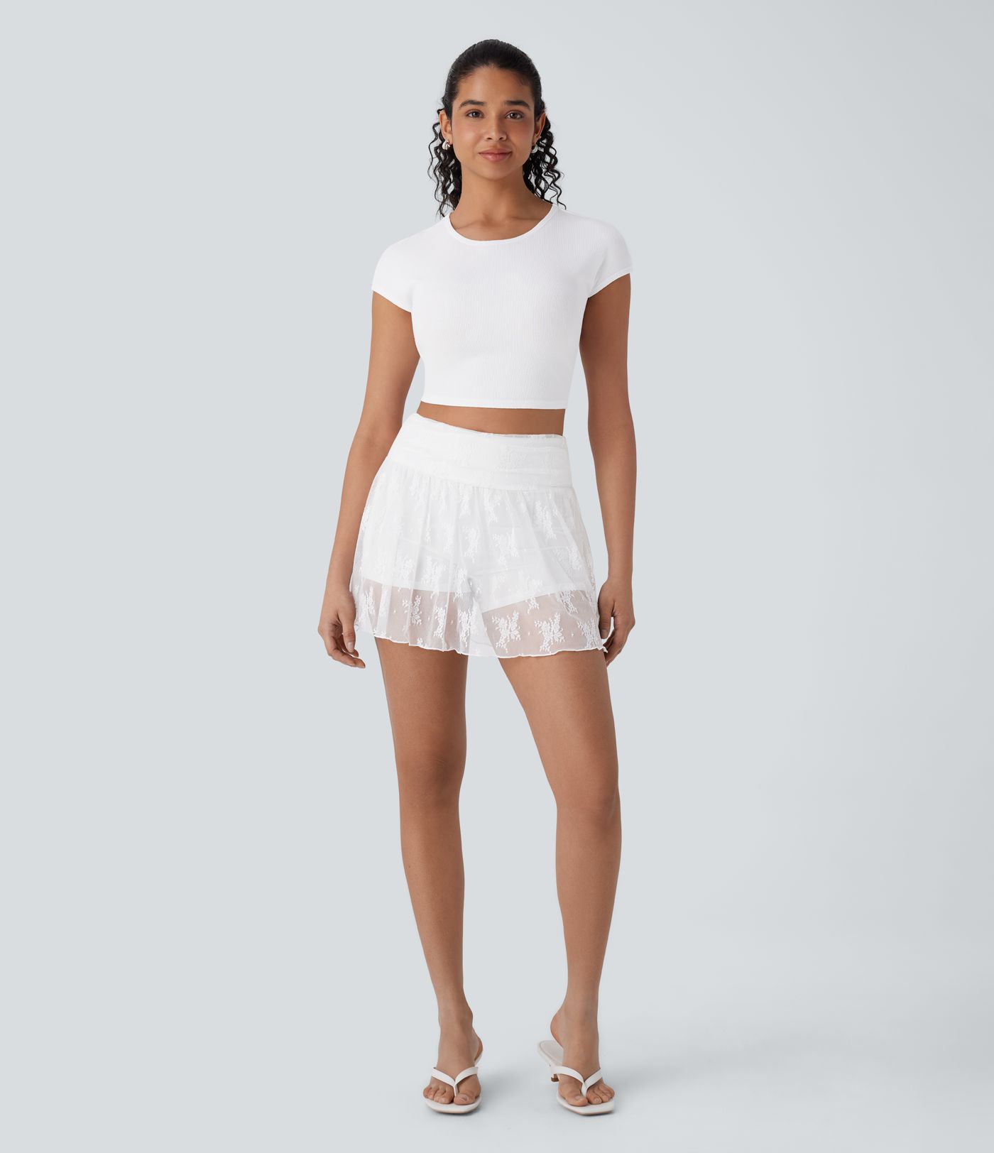 Mini-jupe de soirée taille haute 2-en-1 avec poche latérale et dentelle