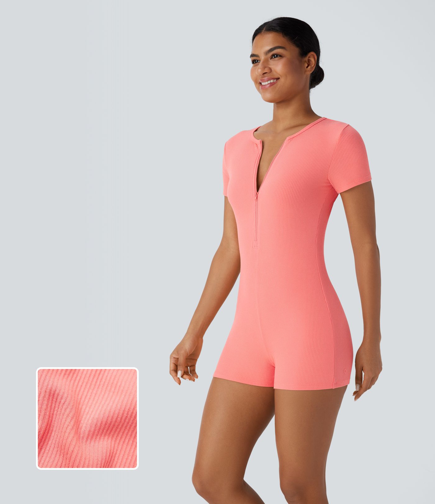 Combinaison décontractée moulante en maille côtelée avec col rond et fermeture éclair