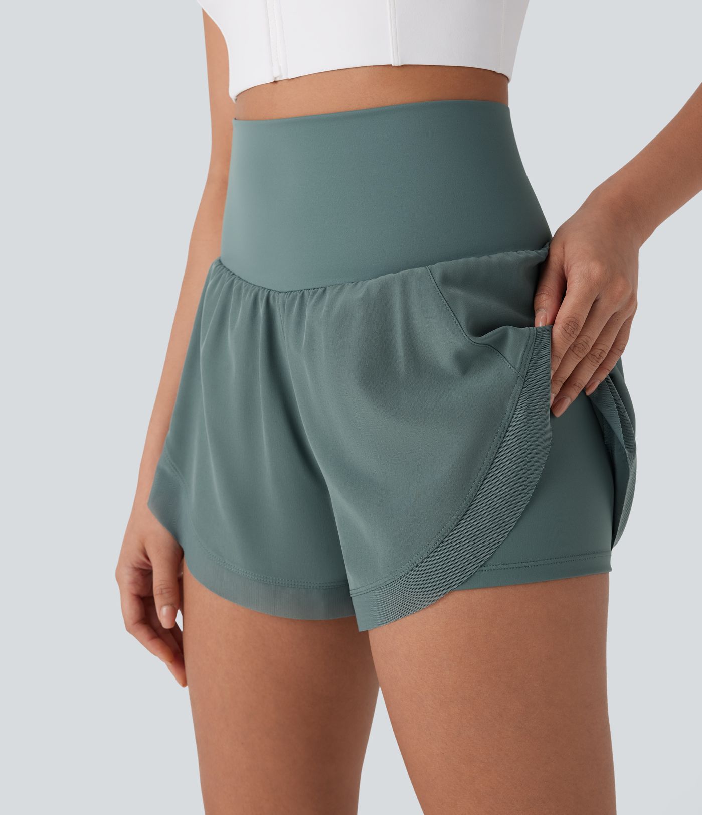 2-in-1 Laufshorts mit hohem Bund, kontrastierendem Netzstoff und abgerundetem Saum - 7,62 cm