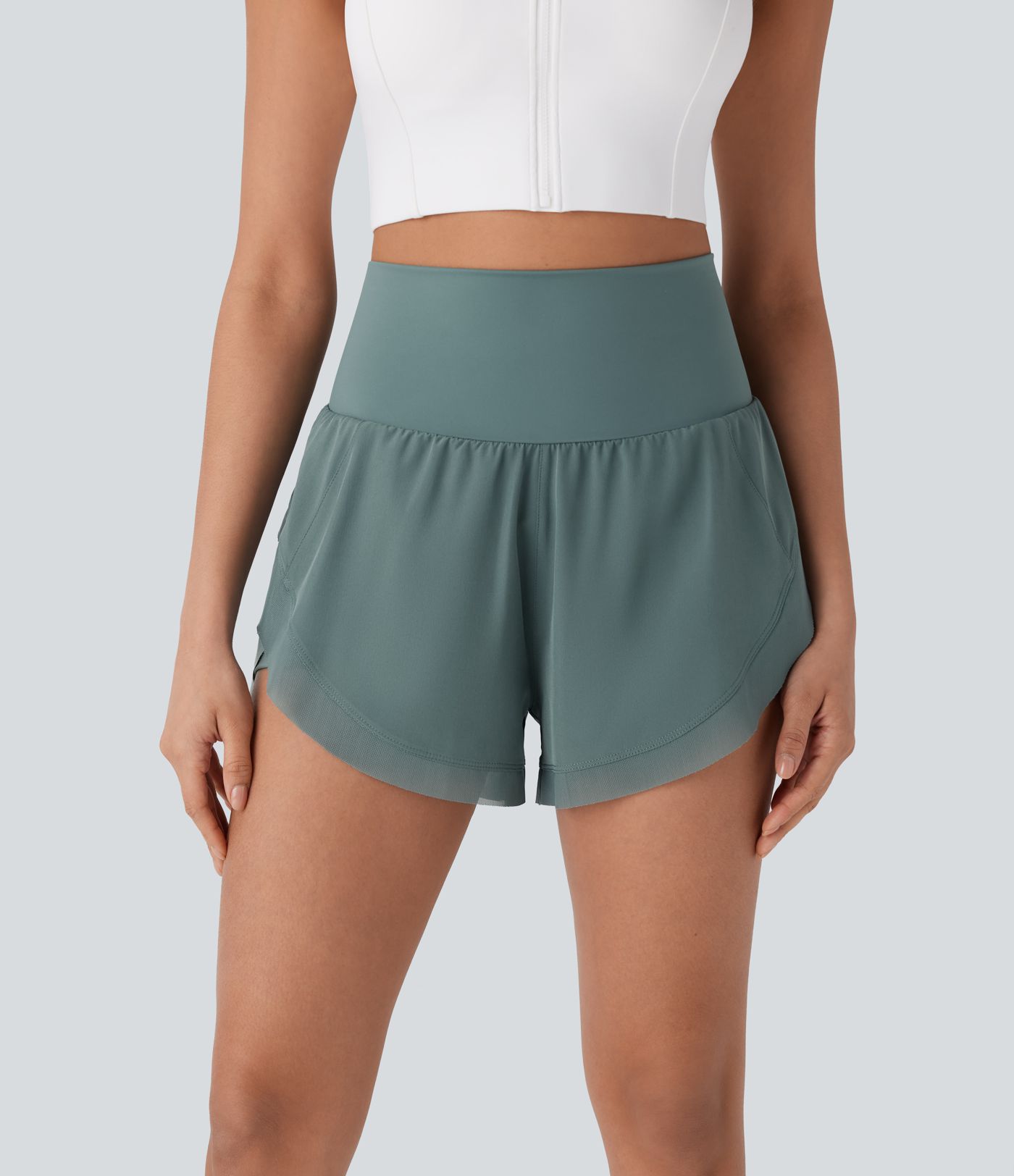 2-in-1 Laufshorts mit hohem Bund, kontrastierendem Netzstoff und abgerundetem Saum - 7,62 cm