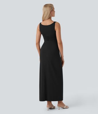 Long, fitted, sleeveless party dress with a gathered turn-neck and turtleneck.