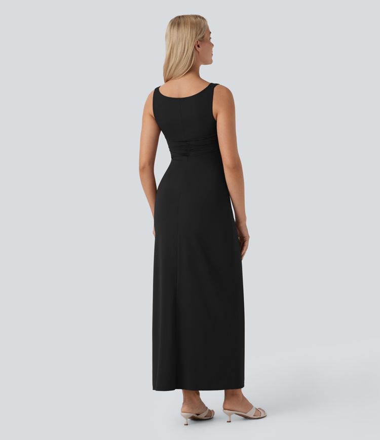 Long, fitted, sleeveless party dress with a gathered turn-neck and turtleneck.