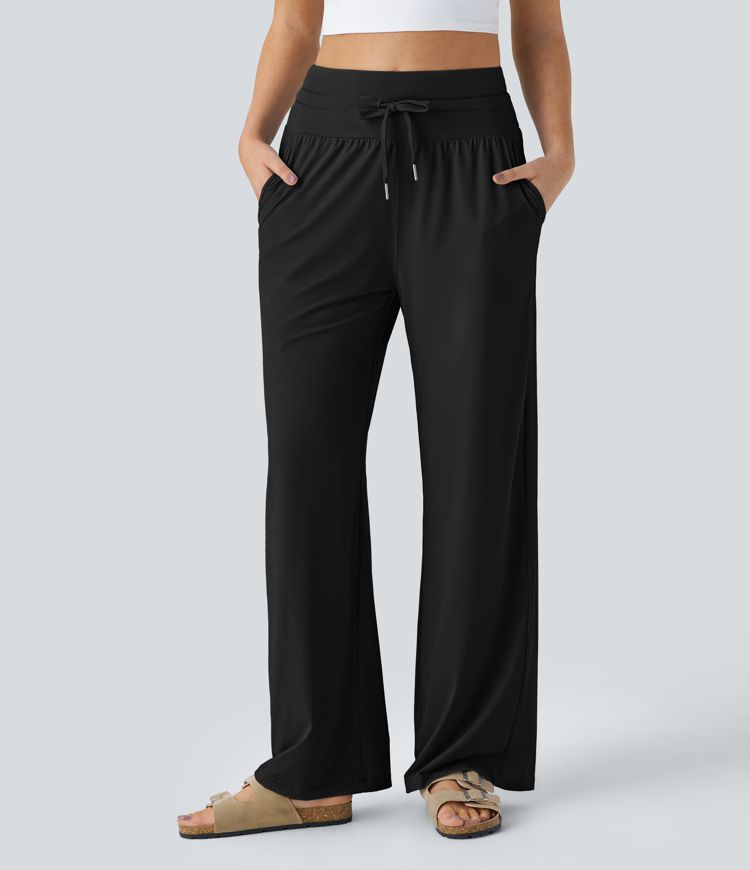 Pantalón tiro alto cordón bolsillo lateral pierna ancha tacto fresco