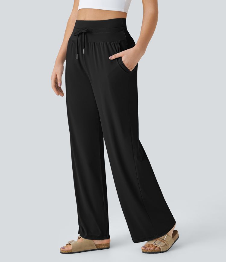 Pantalón tiro alto cordón bolsillo lateral pierna ancha tacto fresco