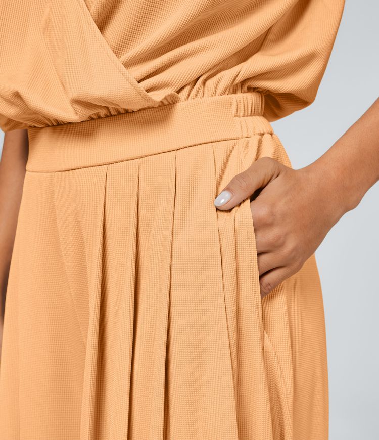 Combinaison Casual Col en V Jambes Large Plissée Manches Courtes Poche Latérale Gaufrée Fluide