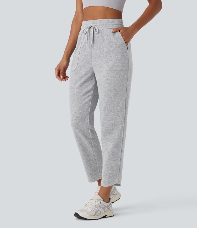 Pantalón correr ajustado tiro alto bolsillo lateral cordón ajustable