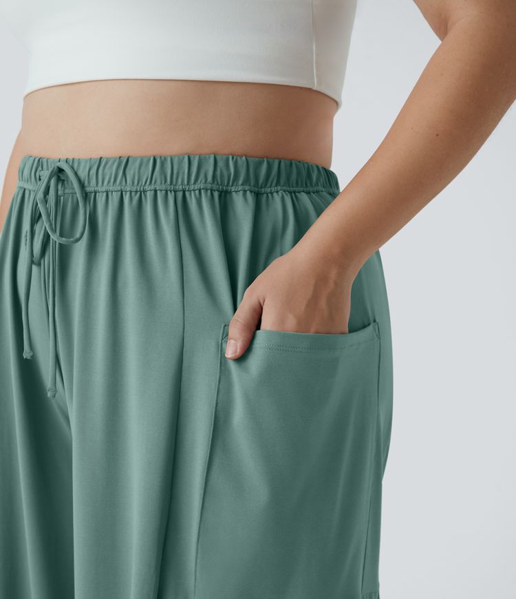 Plus-Size, fließende, lässige Palazzo-Hose mit mittelhohem, elastischem Bund, Kordelzug, Seitentaschen und weitem Bein
