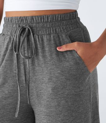 Pantalon taille haute ample en velours côtelé suédé, poches et volants