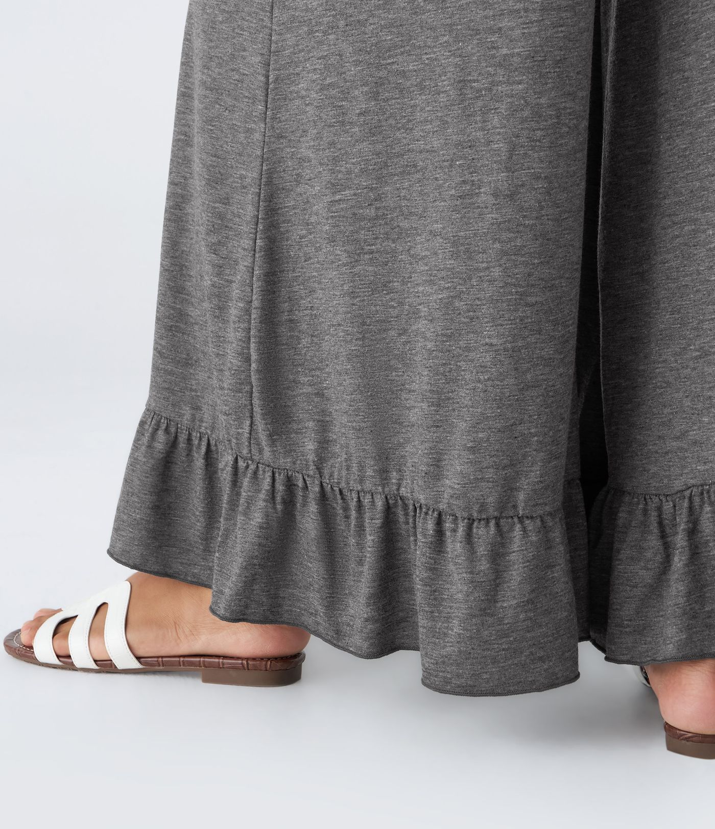 Pantalon taille haute ample en velours côtelé suédé, poches et volants