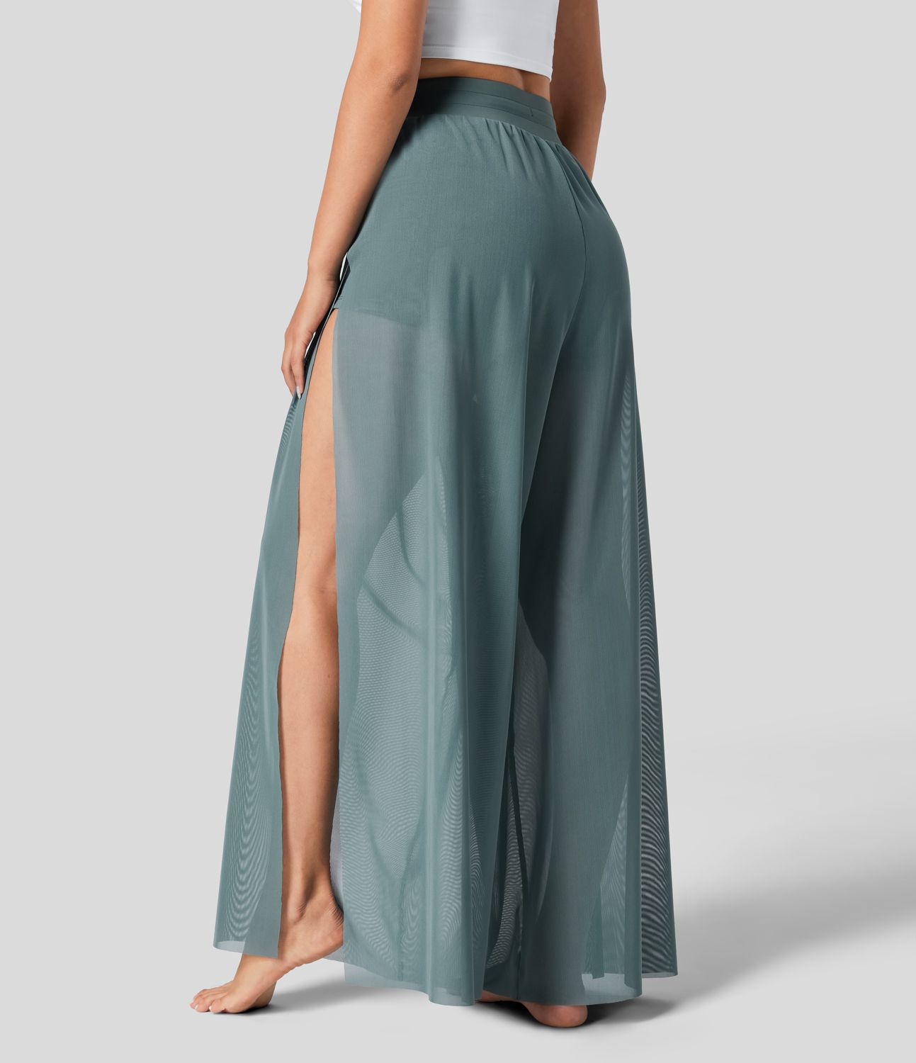 Pantalón yoga fluido pierna ancha bolsillo lateral 2 en 1 abertura malla contrastante cordón tiro alto