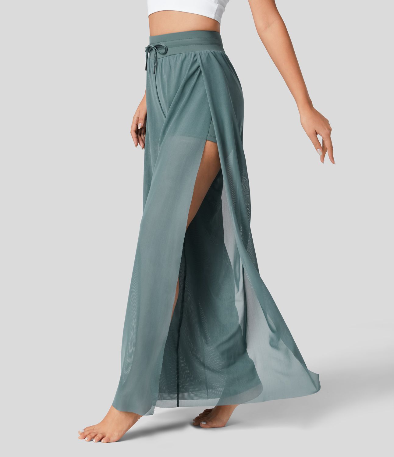 Pantalón yoga fluido pierna ancha bolsillo lateral 2 en 1 abertura malla contrastante cordón tiro alto