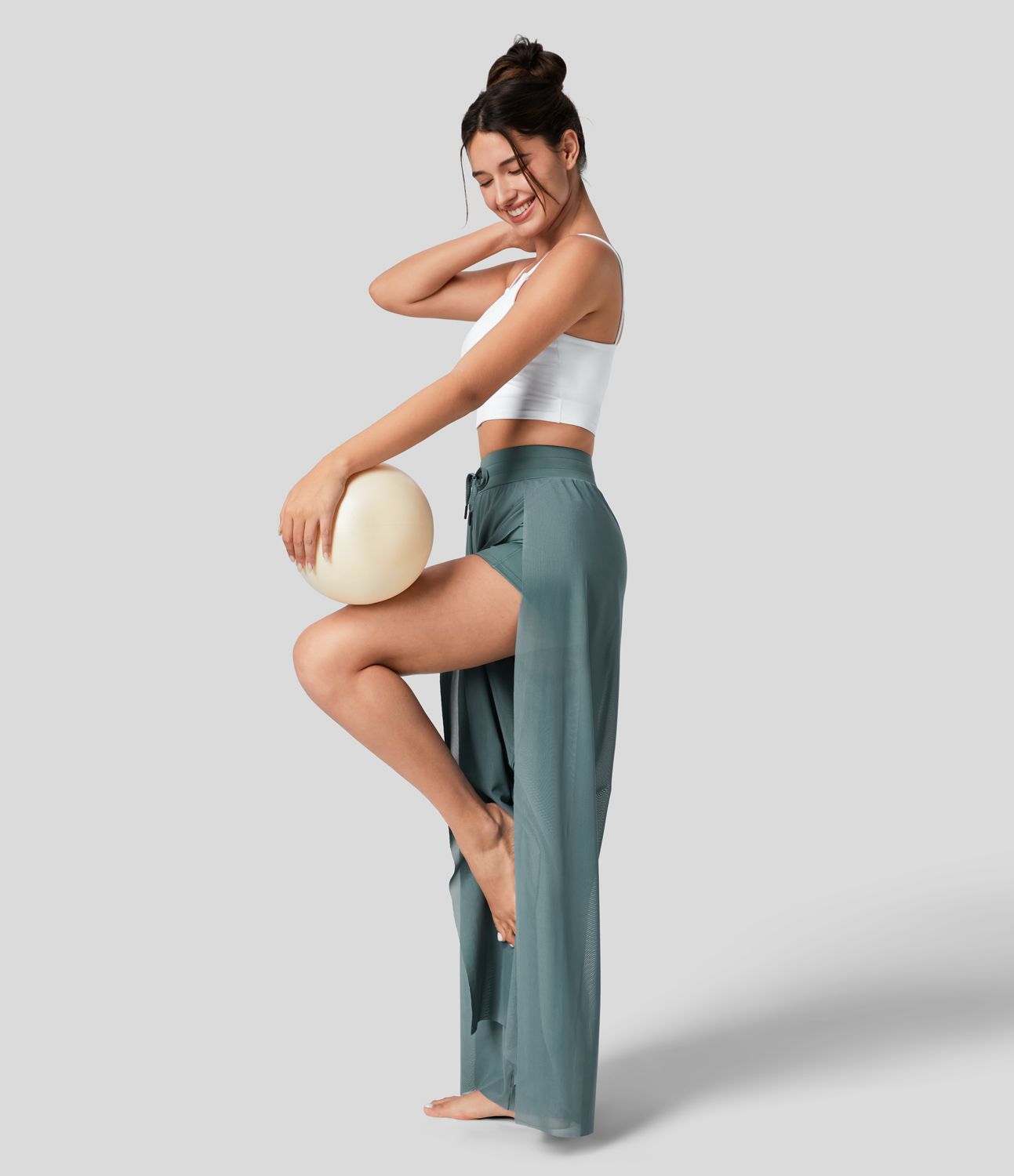 Pantalón yoga fluido pierna ancha bolsillo lateral 2 en 1 abertura malla contrastante cordón tiro alto