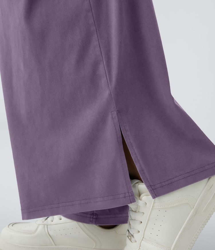 Pantalón ancho tiro alto plisado bolsillo lateral dobladillo dividido cremallera botón