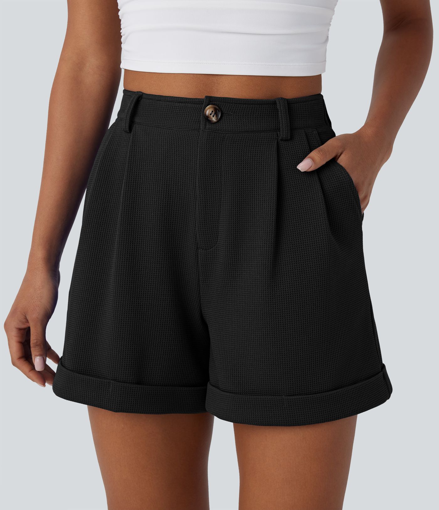 Ψηλόμεσα, χαλαρά σορτς με υφή βάφλας και τσέπες με φερμουάρ