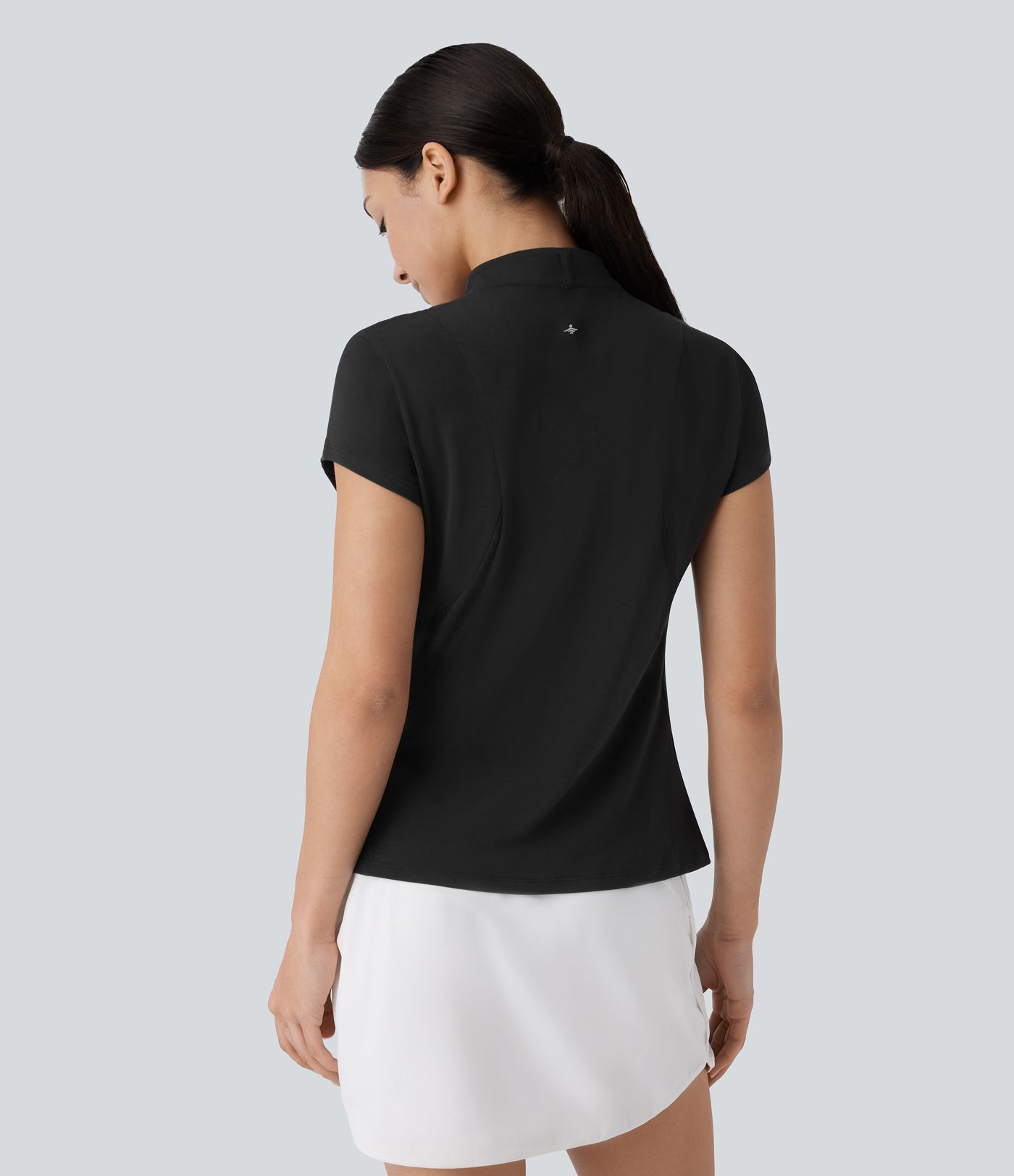 Haut de sport de golf col montant avec empiècements mesh contrastés, zip et séchage rapide