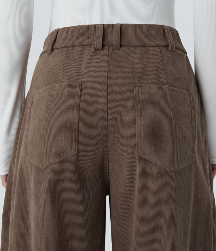 Pantalon décontracté en velours côtelé à taille moyenne, jambes bouffantes longueur cheville, poches multiples et fermeture zippée