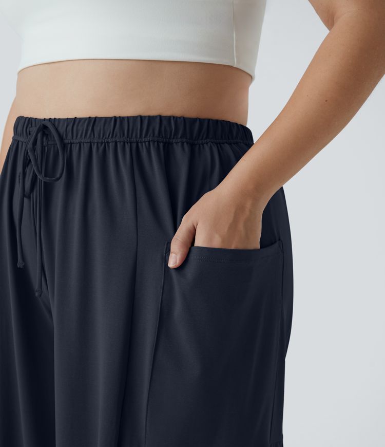 Pantalones Palazzo fluidos de tiro medio con cintura elástica, cordón y bolsillos laterales en tallas grandes