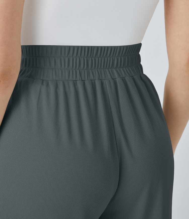 Fließende Palazzo-Hose mit hohem Bund, Seitentaschen, Waffelstruktur und weitem Bein