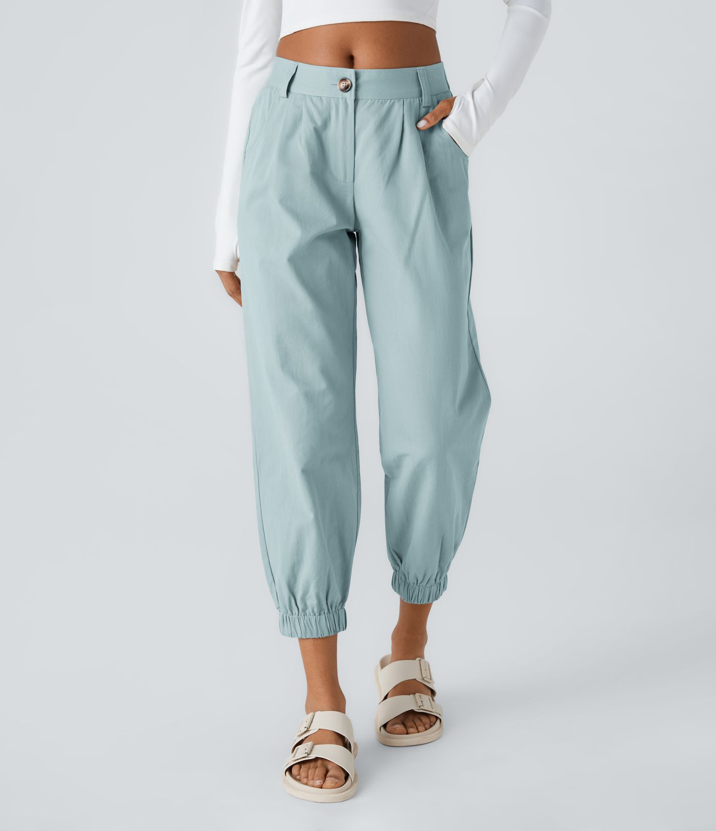 Keskikorkeat puuvillaiset rennot joggerit vetoketjutaskulla