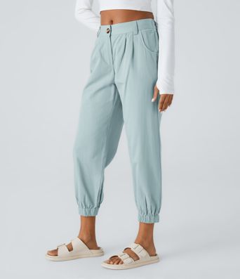 Keskikorkeat puuvillaiset rennot joggerit vetoketjutaskulla