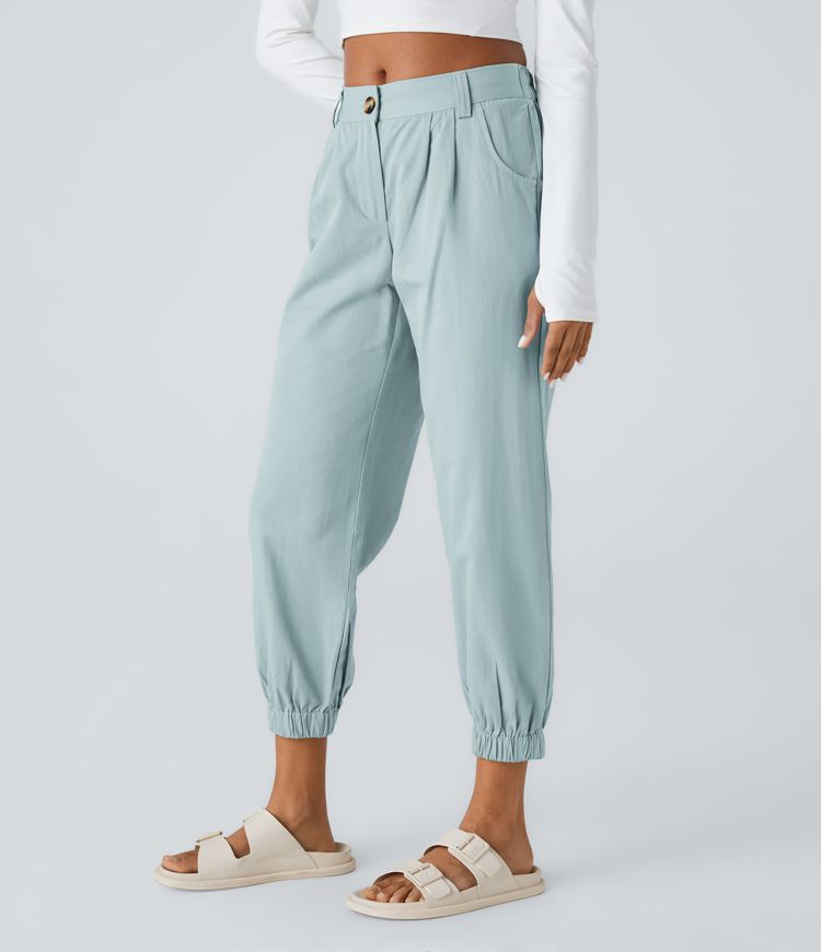 Keskikorkeat puuvillaiset rennot joggerit vetoketjutaskulla