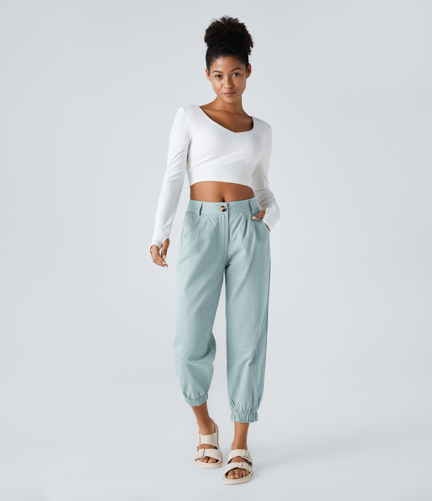 Keskikorkeat puuvillaiset rennot joggerit vetoketjutaskulla