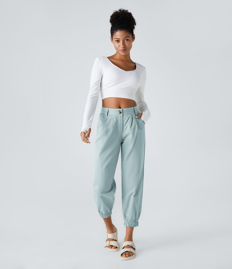 Keskikorkeat puuvillaiset rennot joggerit vetoketjutaskulla