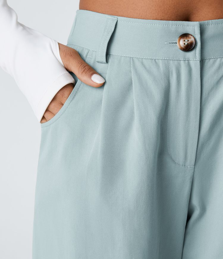 Keskikorkeat puuvillaiset rennot joggerit vetoketjutaskulla