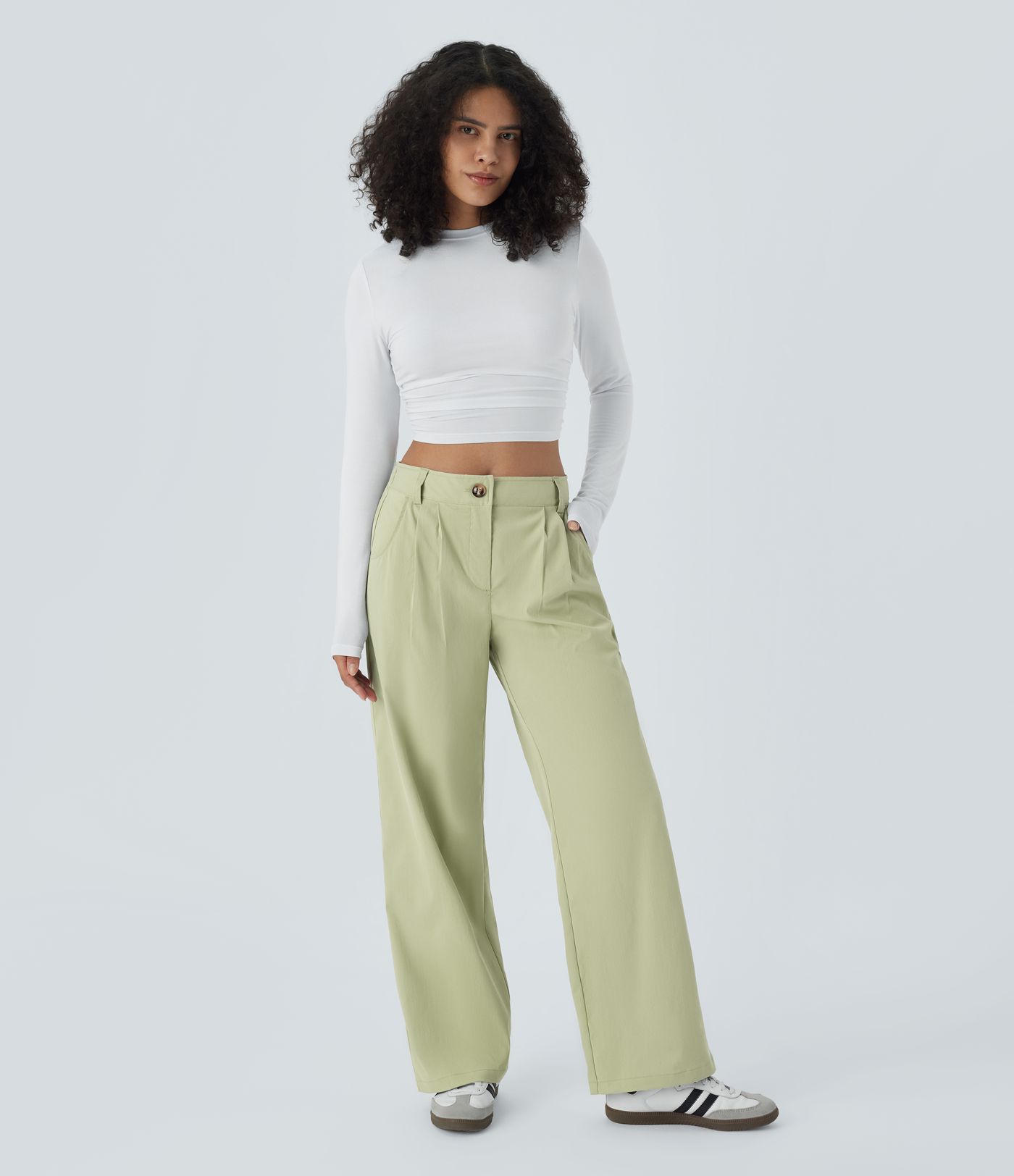 Pantalones casuales rectos con botones de altura media, cremallera lateral y bolsillos