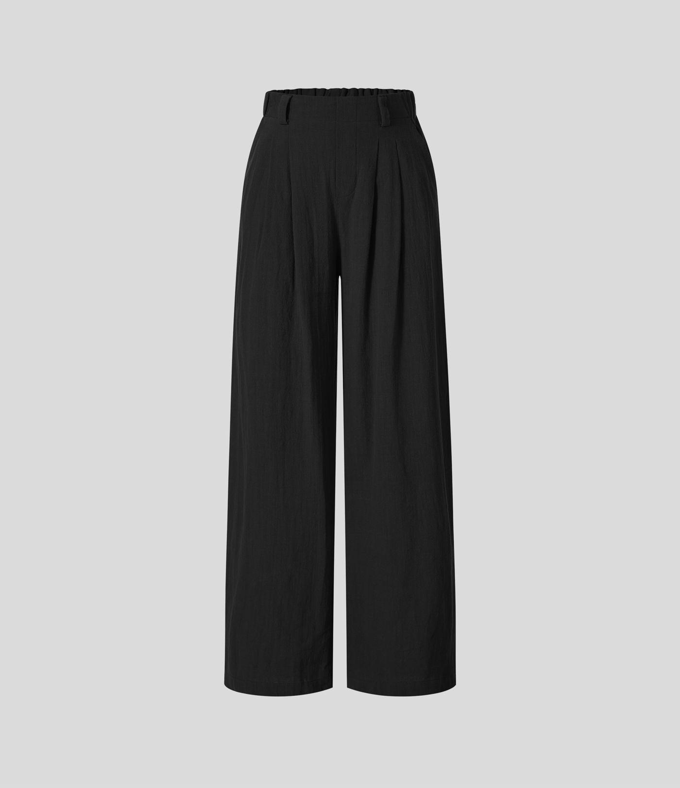 Pantalón tiro alto bolsillo lateral plisado pierna ancha